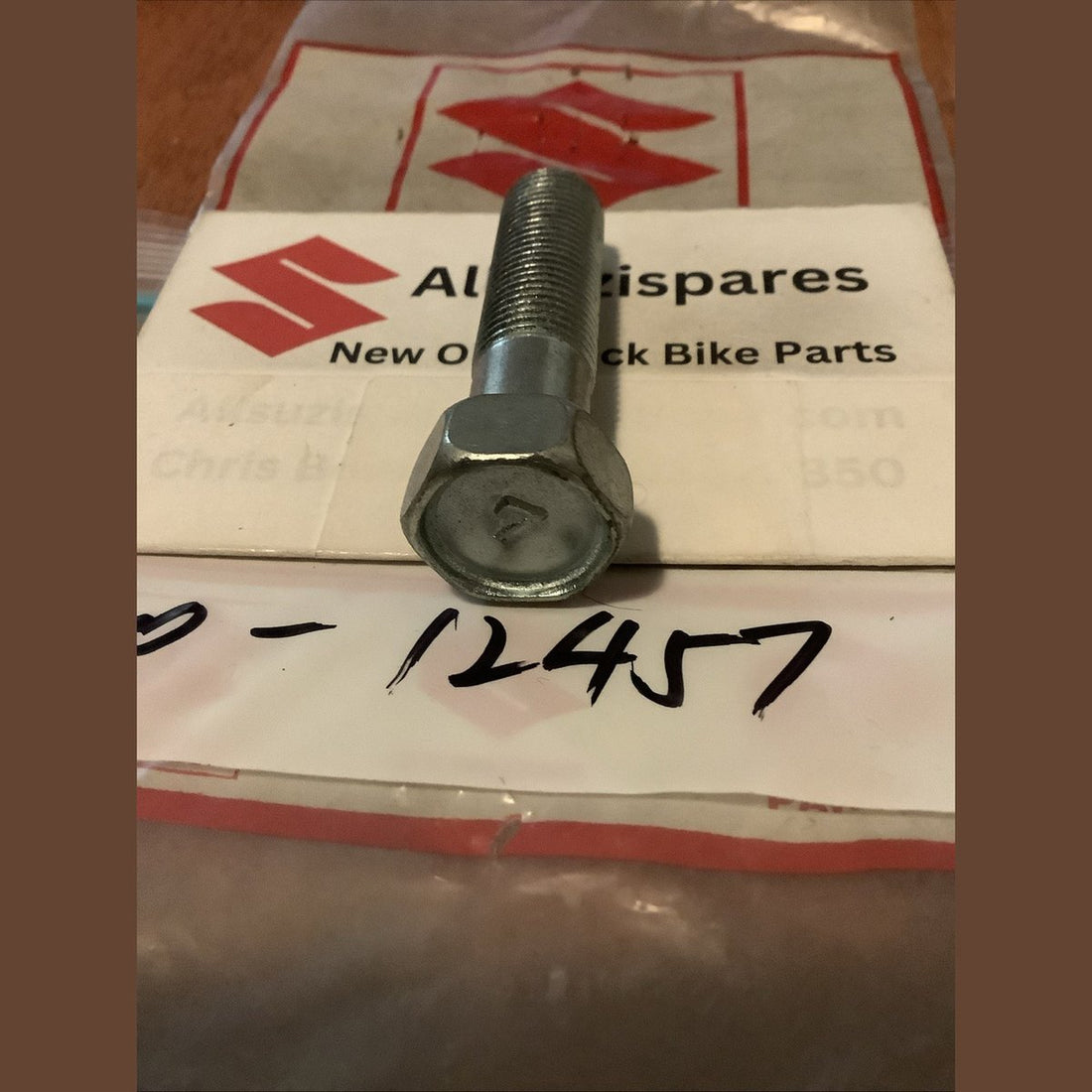 Suzuki Triple Tree 01500-12457, image 1 of 2